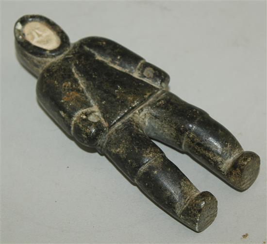 An Inuit carved soapstone figure of a male standing, 5.25in.